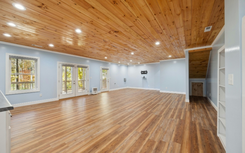 Timber floor with rugs in a bright room